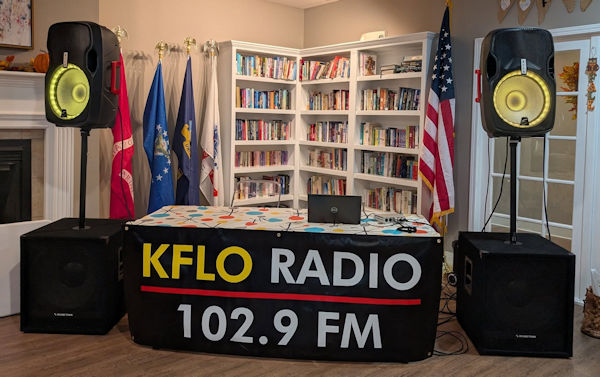 KFLO remote broadcast tent and equipment set up at an outdoor event